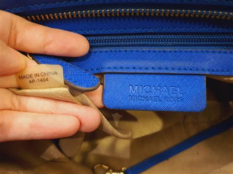 how to tell if a michael kors purse is real|michael kors serial number checker.